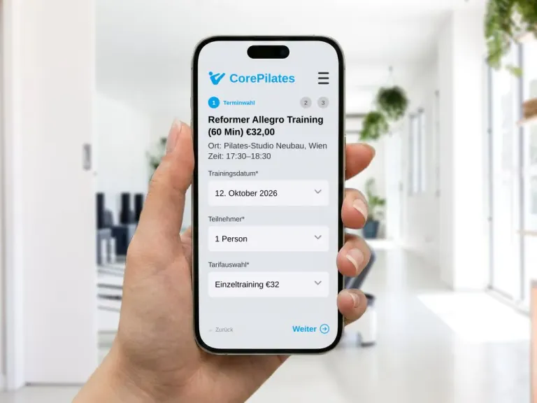 Smartphone mit Online-Buchungsformular für ein Pilates-Reformer-Training