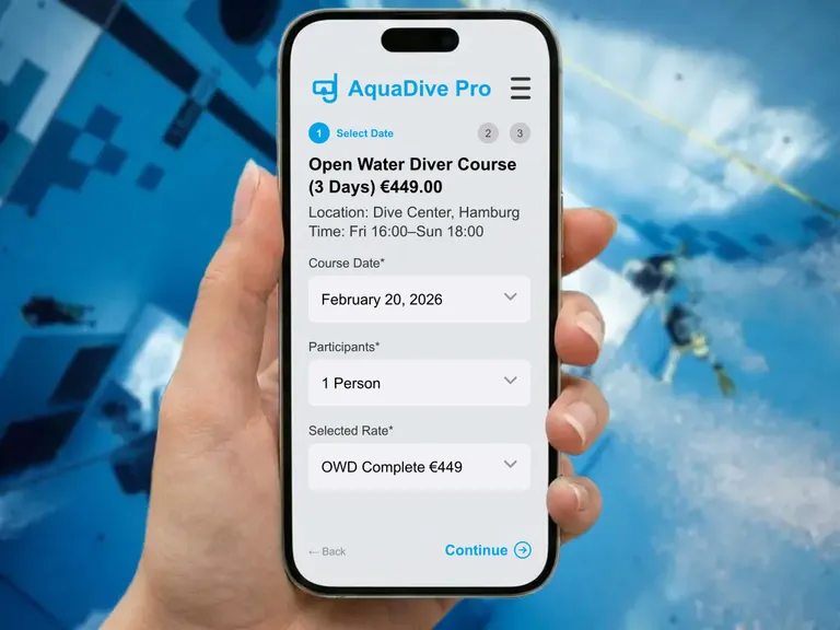 Smartphone with online booking form for an Open Water diving course in front of a dive pool